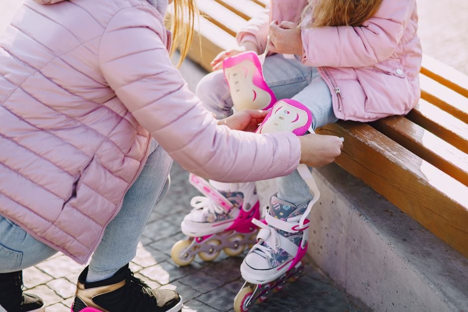 Protective gear for skating: helmet, knee pads, elbow pads.